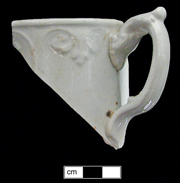 Pitcher molded with acanthus leaf pattern.